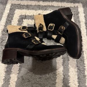 Vince Camuto Black and Natural Shearling Gold Buckle Boots